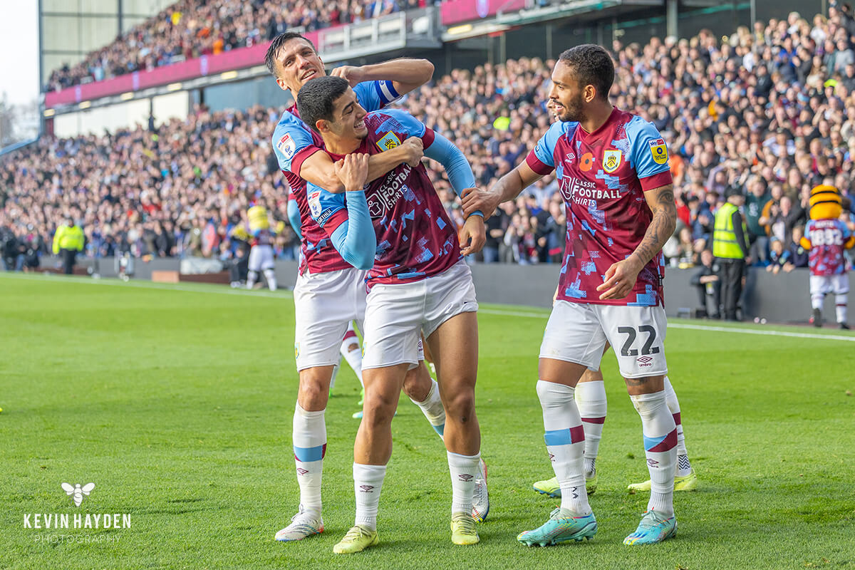 Burnley's captain Jack Cork celebrates a goal against Blackburn with Anaas Zaroury at Turf Moor, Burnley. Photo by Kevin Hayden.